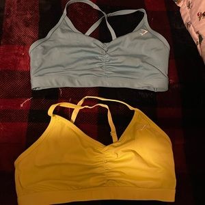 2 Gymshark sports bras, blue & yellow, size: LG